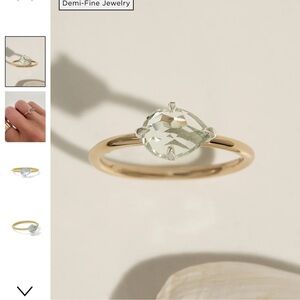 Elegant Gold Ring with Silver Gemstone